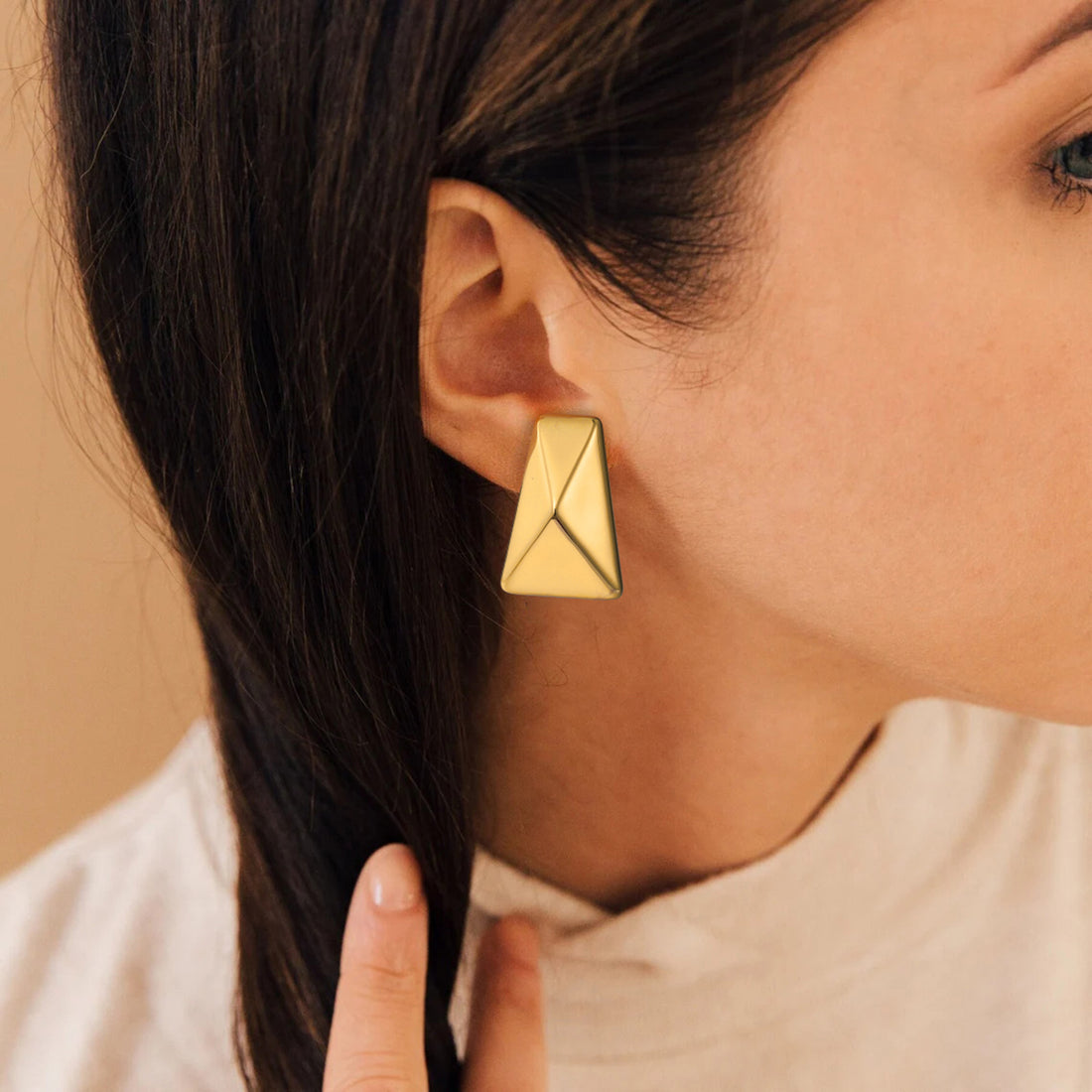 Golden, long trapezoidal, thick and heavy earrings
