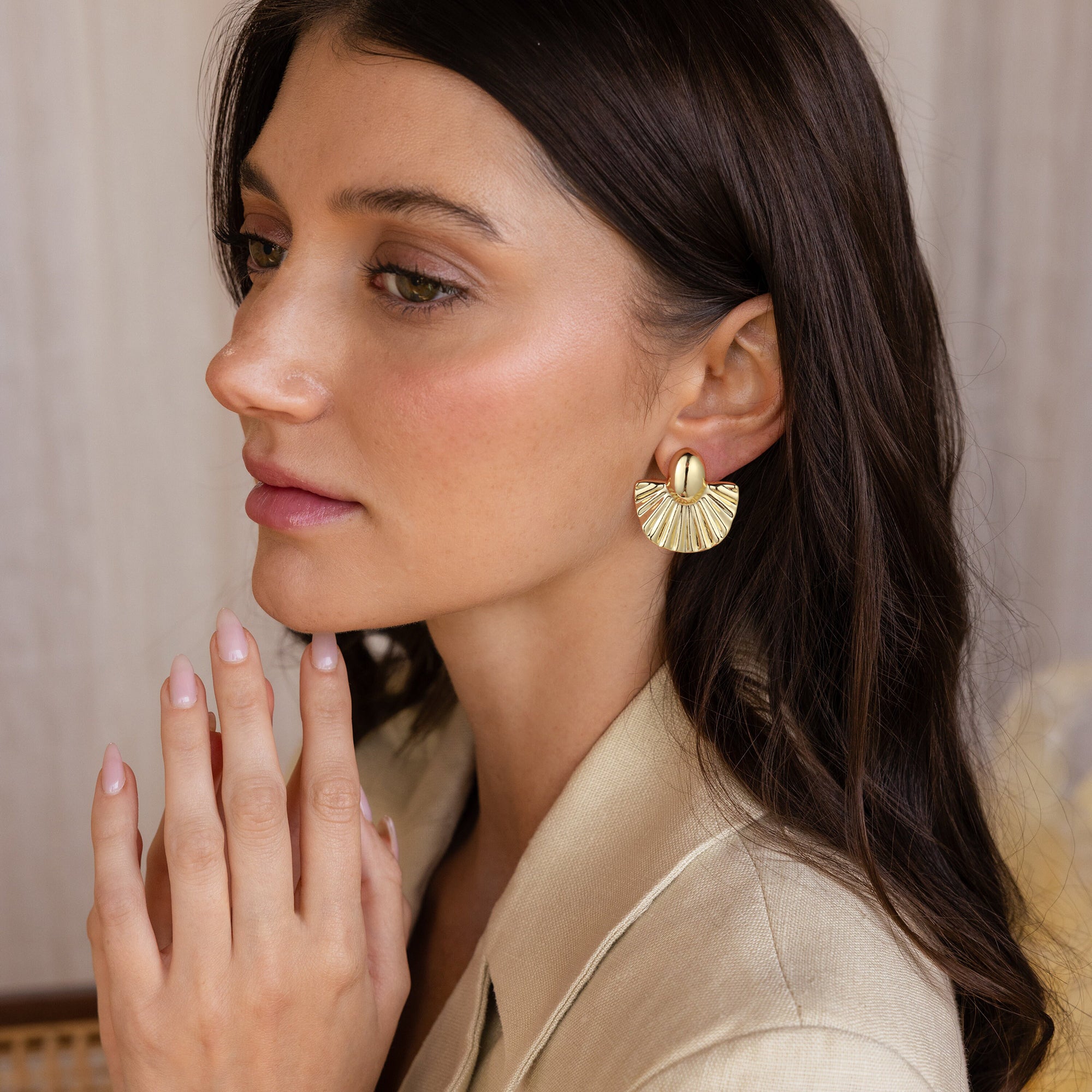 Golden, ginkgo leaf-shaped earrings